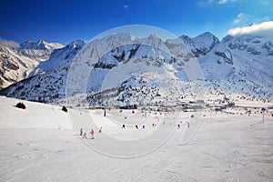 Stunning winter panorama in Tonale ski resort. View of Adamello, Presanella mountains from Tonale town, Italian Alps, Europe photo