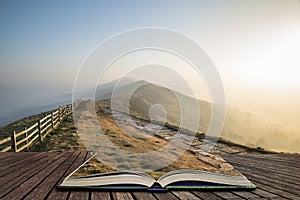 Stunning Winter sunrise landscape image of The Great Ridge in the Peak District in pages of open book, story telling concept