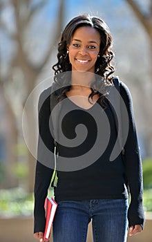 Stunning young African American female student on campus