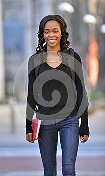 Stunning young African American female student on campus