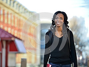 Stunning young African American female student on campus