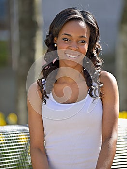 Stunning young African American woman - white tank