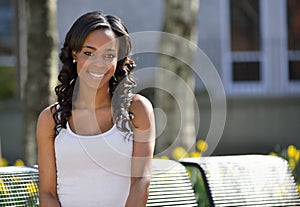 Stunning young African American woman - white tank