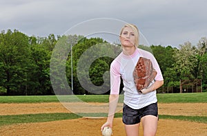 Stunning young blonde female softball player