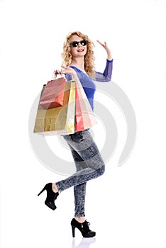 Stunning young woman carrying shopping bags