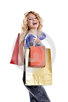 Stunning young woman carrying shopping bags