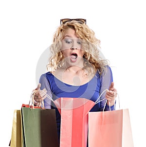 Stunning young woman carrying shopping bags