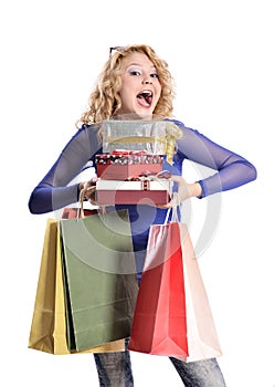 Stunning young woman carrying shopping bags