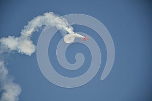 A stunt plane performance at an air show.