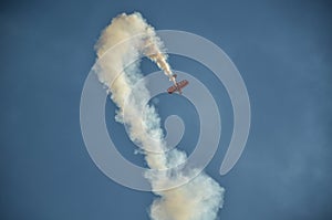 A stunt plane performance at an air show.