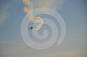 A stunt plane performance at an air show.