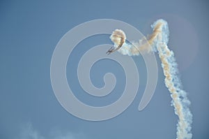 A stunt plane performance at an air show.