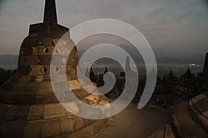 Stupa in Borobudur, ancient buddhist temple near Yogyakarta, Java, Indonesia