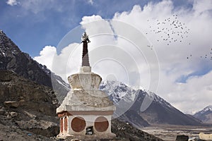 Stupa or chedi in Maitreya Buddha statue and Diskit Monastery or Deskit Gompa at nubra valley village at Leh Ladakh, India