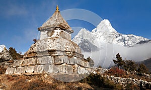 Stupa near Pangboche village with mount Ama Dablam photo
