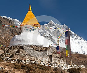 Stupa and prayer flags near Dingboche with mount Lhotse