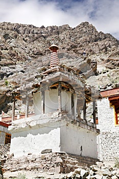 Stupa with sedimentary rock at the backdrop in the Hemis Monastery complex, Leh
