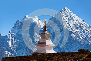 Stupa in Thame village and mount Thamserku and Kangtega