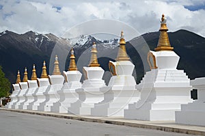 Stupas Infront of Sacred Buddhist Meili Mountain