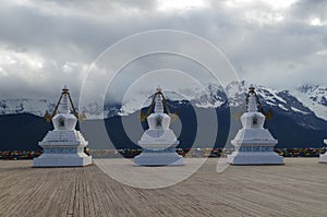 Stupas Infront of Sacred Buddhist Meili Mountain