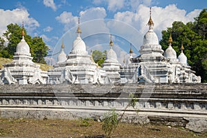 At the stupas of the Sanda Muni pagoda. Mandalay