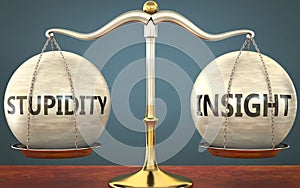 Stupidity and insight staying in balance - pictured as a metal scale with weights and labels stupidity and insight to symbolize photo