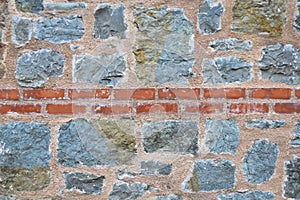 Sturdy blue and gray cut stone brick wall, seamless lined up