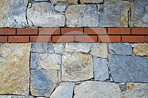 Sturdy blue and gray cut stone brick wall, seamless lined up