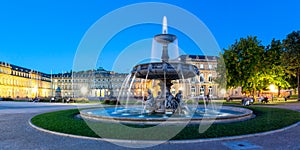 Stuttgart Castle square Schlossplatz Neues Schloss with fountain travel panorama at twilight in Germany