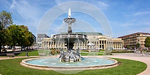 Stuttgart city Castle square Schlossplatz with fountain travel panorama in Germany photo