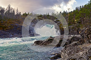 Stuttgongfossen, a powerful waterfall south of Vagamo, located at HindsÃÂ¦te Sjodalen in the region Oppland, Norway photo