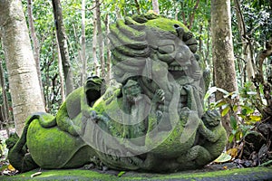 Stutue in Sacred Monkey Forest in Ubud, Bali, Indonesia
