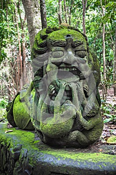 Stutue in Sacred Monkey Forest in Ubud, Bali, Indonesia