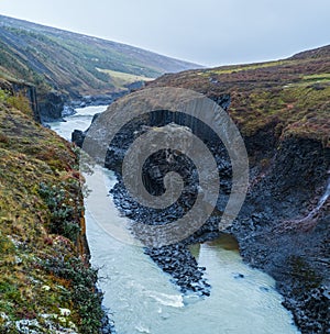 StuÃ°lagil canyon is a ravine in JÃ¶kuldalur, Eastern Iceland. Famous columnar basalt rock formations and JÃ¶kla river runs