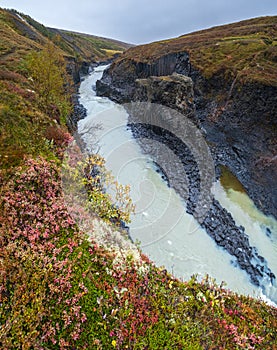 StuÃ°lagil canyon is a ravine in JÃ¶kuldalur, Eastern Iceland. Famous columnar basalt rock formations and JÃ¶kla river runs