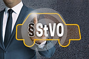 StVO auto touchscreen is operated by businessman concept