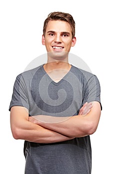 Style, crossed arms and portrait of man with smile in studio with confidence, attractive and pride on white background