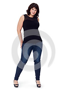 Style, fashion and portrait of woman on a white background with confidence, attitude and smile. Cosmetics, fashion model