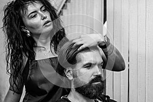 style your hair. brutal bearded man at hairdresser salon. hair wash and care. new stylish haircut.