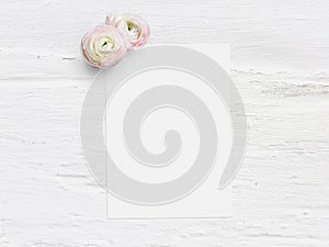 Styled stock photo. Feminine digital product mockup with uttercup flowers, Ranunculus, blank list of paper and shabby