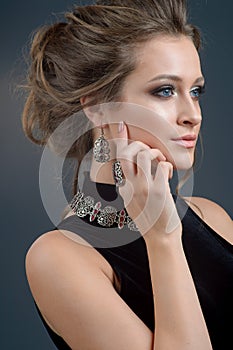 Stylish accessory on woman. Necklace with choker on neck and ear