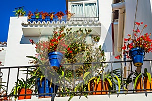 Stylish balcony with a metal railing, solid architectural element, a place of rest and relaxation