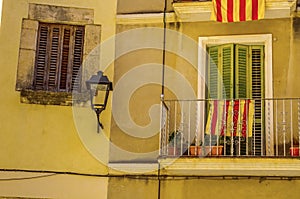 Stylish balcony with a metal railing, solid architectural element, a place of rest and relaxation, vintage decor