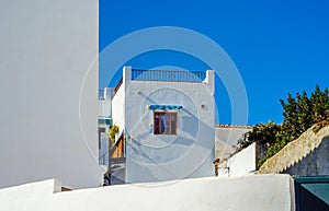 Stylish balcony with a metal railing, solid architectural element, a place of rest and relaxation, vintage decor