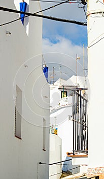 Stylish balcony with a metal railing, solid architectural element, a place of rest and relaxation, vintage decor