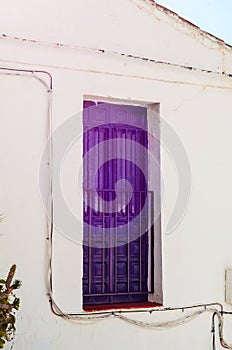 Stylish balcony with a metal railing, solid architectural element, a place of rest and relaxation, vintage decor