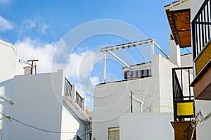 Stylish balcony with a metal railing, solid architectural element, a place of rest and relaxation, vintage decor