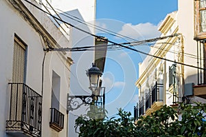 Stylish balcony with a metal railing, solid architectural element, a place of rest and relaxation, vintage decor