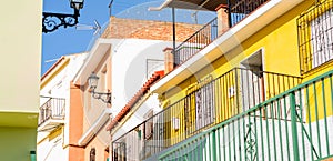 Stylish balcony with a metal railing, solid architectural element, a place of rest and relaxation, vintage decor