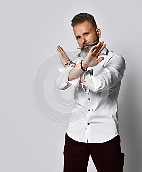 Stylish bearded hipster man gesturing enough denial sign